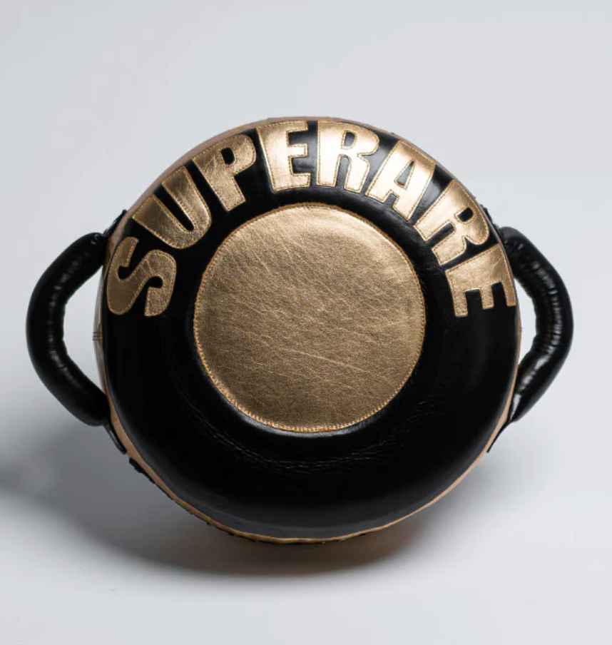 Superare Black and Gold Punch Shield